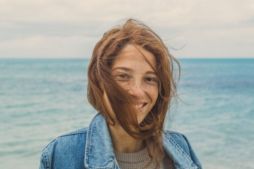 Person smiling, representing support through individual therapy in Fergus, ON